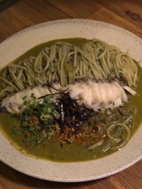 Creamy spaghetti carbonara made with rich egg yolk sauce, crispy bacon, parmesan cheese, and freshly ground black pepper for a classic, indulgent Italian pasta dish.