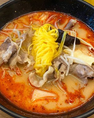 Spicy and numbing malatang with a mix of fresh ingredients in rich Sichuan broth, paired with crispy and tangy guobaorou. A perfect balance of bold heat and sweet-sour crunch for a Chinese feast.