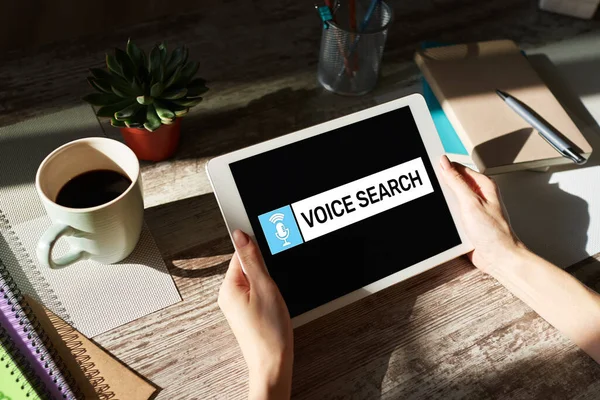 Voice search application on device screen. Internet and technology concept.