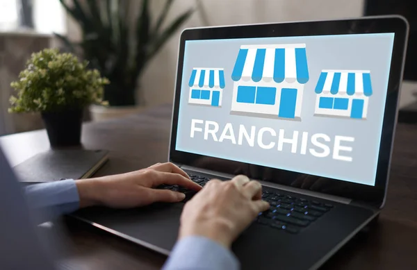 Franchise business model and growth concept on device screen