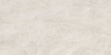 Hafif krem akik mermer yüzeyi yumuşak şeffaf katmanlar ve hassas bulutlu damarlar içerir. Doğal taş dokusu bej, fildişi ve ılık kremin ince tonsal varyasyonlarını sergiler ve lüks içinde rafine ve zarif bir arkaplan oluşturur.