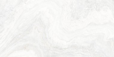 Gri ve ince altın tonlarda yumuşak akan damarlar içeren rafine beyaz mermer bir yüzey. Doğal taş deseni zarif ve lüks bir estetik yaratıyor, genellikle kaliteli iç mekanlar, mimari yüzeyler, fayanslar, tezgahlar,