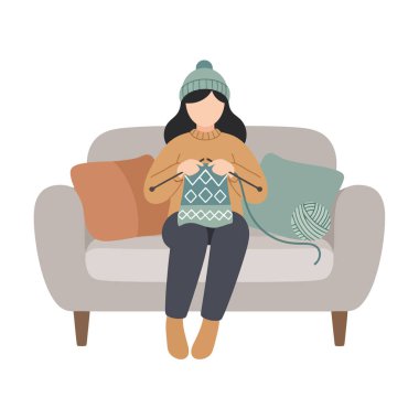 Rahat bir kadın kanepede örgü örüyor, evde el yapımı sıcaklık ve konfor yaratıyor.