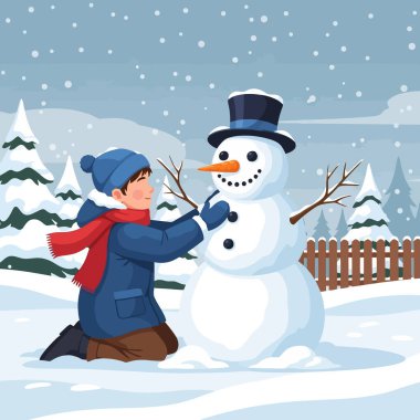 Karlı kış harikalar diyarında neşeyle kardan adam yapan genç çocuk.