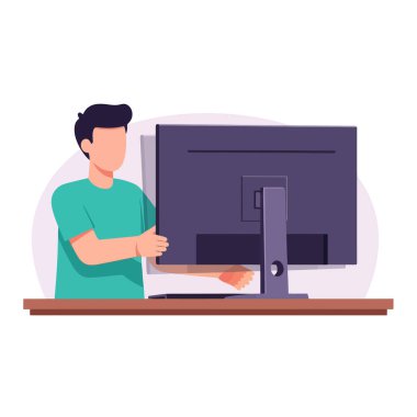 Modern workspace scene with focused man working at his computer screen