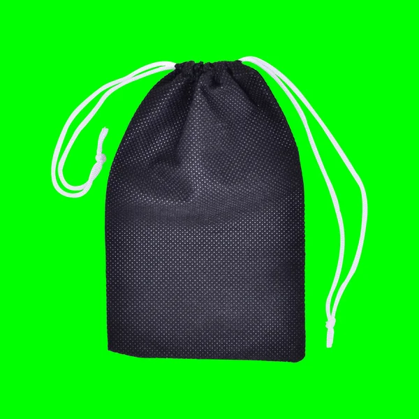 Fekete táskák fehér kötél szövet zöld képernyő — Stock Fotó