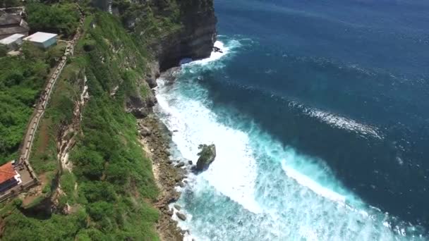 Aerial view Uluwatu temple on the coast of Bali island — Stock Video