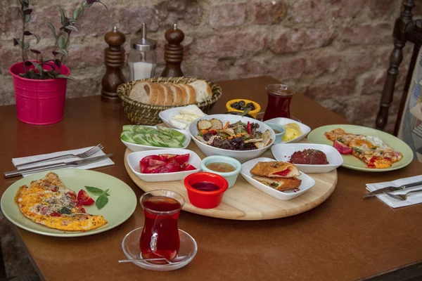 Breakfast on a wooden table — Stock Photo, Image