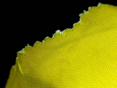 close up of microfiber fabric texture with dark background