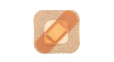 Kahverengi yapıştırıcı bandaj beyaz arkaplanda