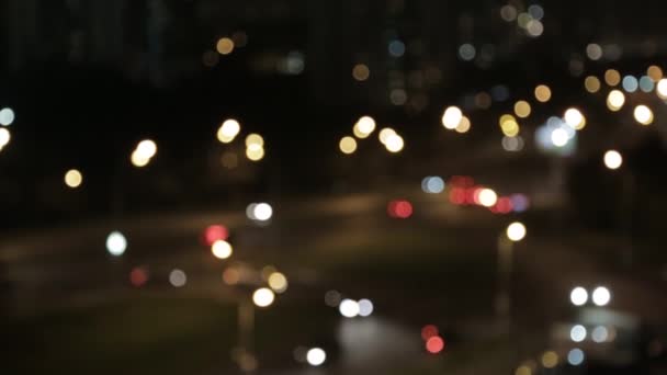 在夜晚城市的灯光模糊 — 图库视频影像