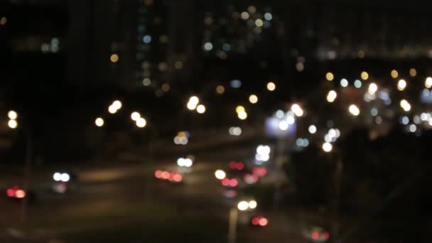 Las luces de la noche de la ciudad nocturna — Vídeo de stock