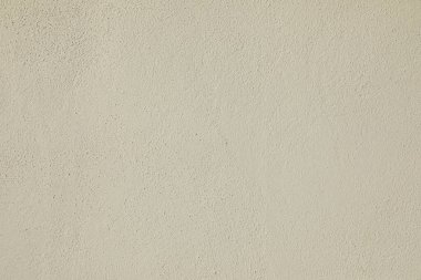 Yumuşak tonlara ve gölgelere sahip desenli bej alçı modern iç mekanlar veya soyut sanatlar için sakin, pürüzsüz bir zemin sağlar..