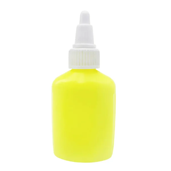 Yellow bottle of PVA glue with white cap isolated on white.