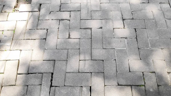 close-up photo of a floor made of strong paving blocks and natural stone