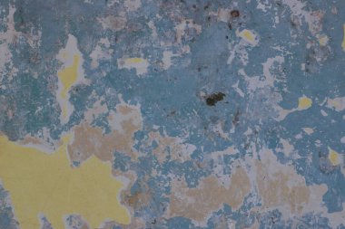 Yıpranmış ve yıpranmış mavi ve beyaz boya tabakaları güzel, kirli bir arka plan dokusu yaratıyor..