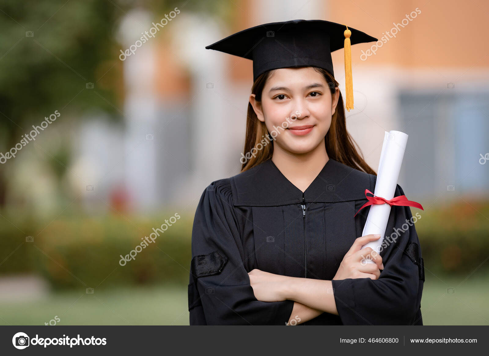 Student in Graduation Gown and Mortarboard · Free Stock Photo