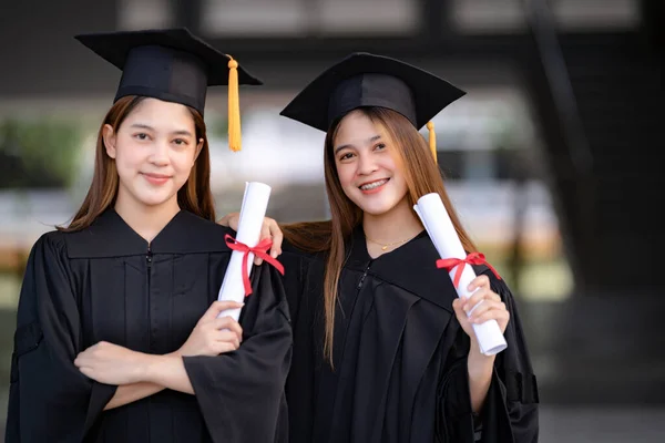Young Happy Asian Woman University Graduates Graduation Gown Mortarboard Hold — Stock Photo, Image