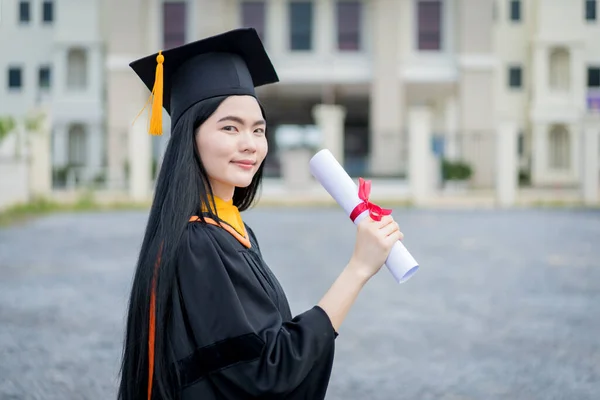 Young Beautiful Asian Woman University Graduate Graduation Gown Mortarboard Holds — Stock Photo, Image