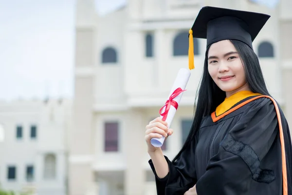 Young Beautiful Asian Woman University Graduate Graduation Gown Mortarboard Holds — Stock Photo, Image