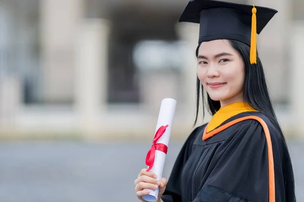Young Beautiful Asian Woman University Graduate Graduation Gown Mortarboard Holds — Stock Photo, Image
