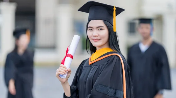 Young Beautiful Asian Woman University Graduate Graduation Gown Mortarboard Holds — Stock Photo, Image