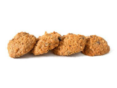 Beyaz arka planda yulaflı kurabiye yığını. Üst görünüm.