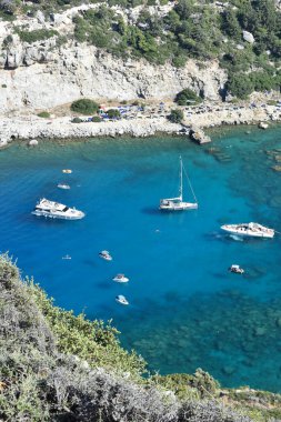 Anthony Quinn Bay, Rhodes Island, Greece. View from Anthony Quinn viewpoint. Panoramic sea paradise landscape. Travel to Greece. Summer and holidays. Bird's eye view from above, rocks, clear sea
