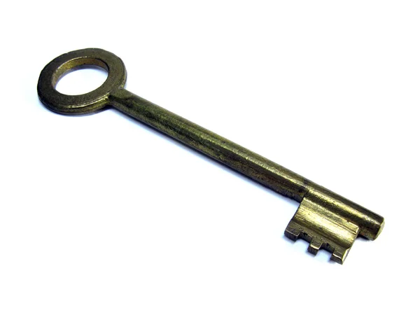 Dörren nyckeln på vit bakgrund. Nyckeln i dörren. — Stockfoto