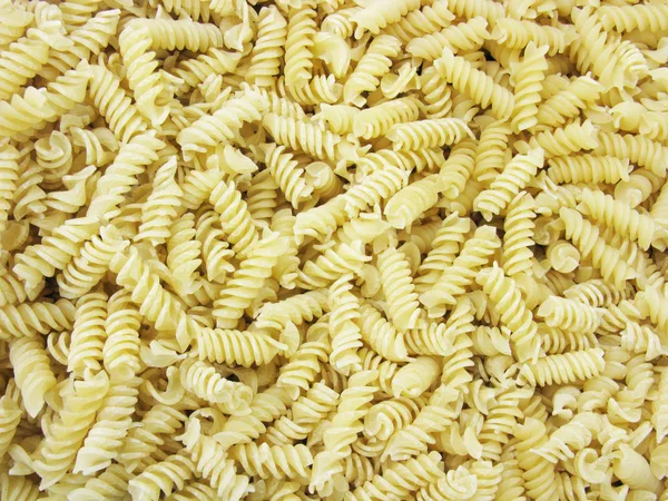 Pasta achtergrond. Verspreide pasta. — Stockfoto