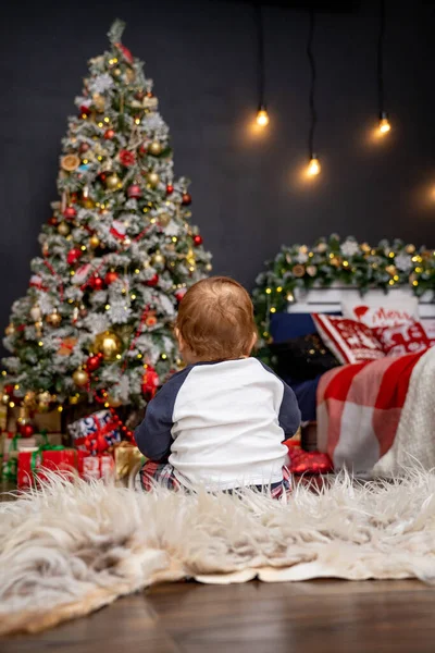 Little Baby Year Old Sits Fluffy Carpet Looks Christmas Tree — Stock Photo, Image