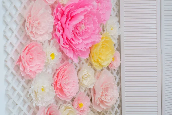 flower is made of corrugated paper. Large Paper Flowers. Peonies. Pink floral background pattern. The flower is made of corrugated paper. Delicate floral decoration. Close the copy space. Decoration