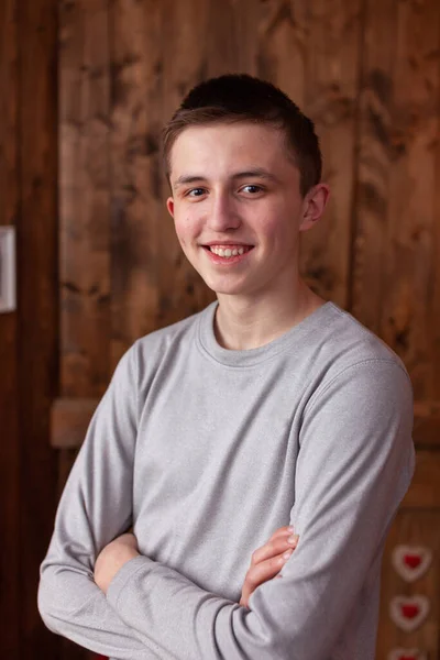 Portrait Beautiful Smiling Teenager Gray Hoodie Posing Brown Wooden Wall — Stock Fotó