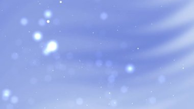 Yumuşak mavi parlak bokeh ışıkları sakin, büyülü bir atmosfer yaratır, arka planlar için mükemmel, kış temaları, rahatlama, ya da yaratıcı tasarım projeleri.