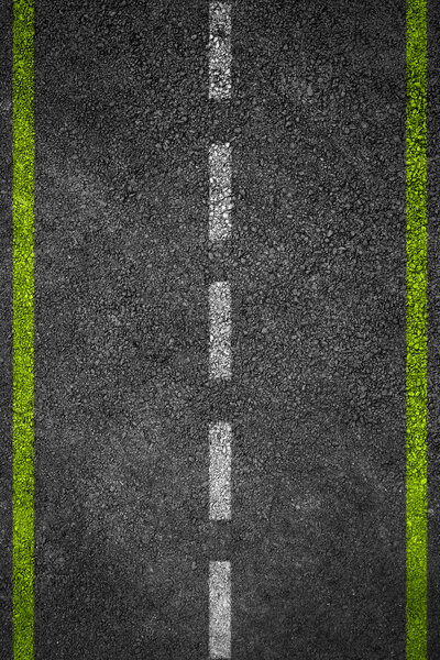 Road texture with two yellow stripes and dashed white stripe