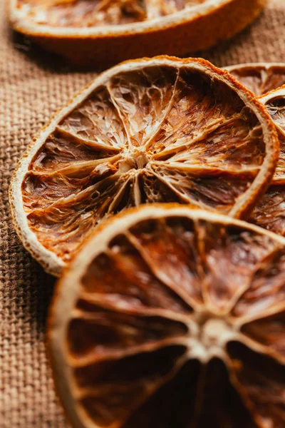 Dried lemon and orange on a light background sacking