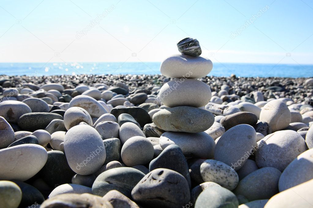 Balance pebbles on the beach