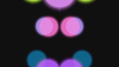 Siyah Arkaplanda Renkli Bulanık Halkalar.