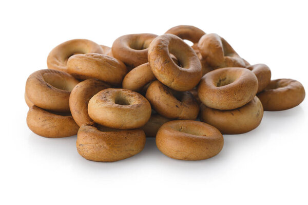 Classic East Slavic ring-shaped bread pastry known as sushki, piled in an appetizing heap. Traditional dry bakery product for tea drinking. 