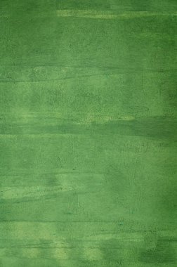 Yeşil boyalı bir duvarın yakın çekimi, tasarım, iç mekan ve arkaplan boyası için mükemmel bir arka plan. Yüksek kalite fotoğraf