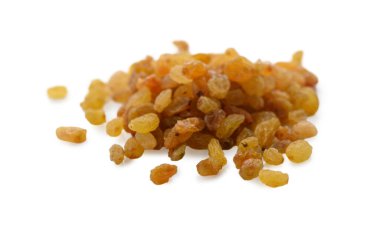 Organic golden raisins randomly scattered on pure white background. Shallow depth of field focuses on selected berries, emphasizing their wrinkled texture and translucent golden-honey color.