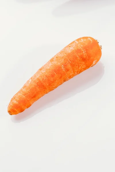 Fresh raw carrots on a white background — Stock Photo, Image