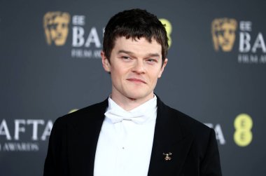 Robert Aramayo, 22 Şubat 2026 'da Londra' daki The Royal Festival Hall 'da düzenlenen 2026 EE BAFTA Film Ödülleri' ne katıldı..