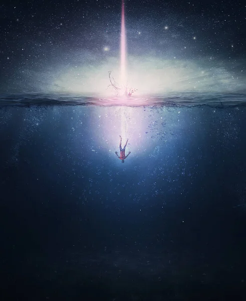 一个人在水下坠落的超现实场景 就像一颗彗星从夜空坠落入大海 幻想和神秘的概念 神奇的冒险 — 图库照片