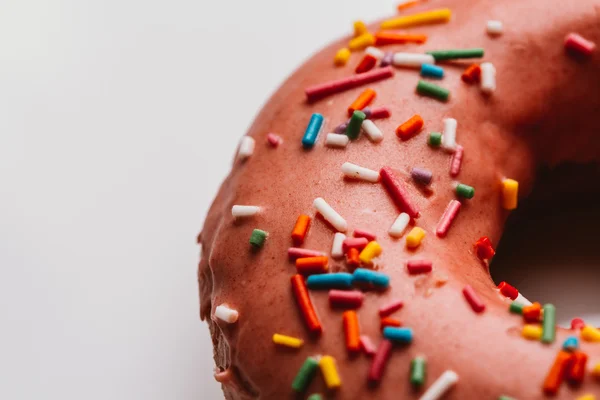 Fresh delicious donut with strawberry cream on a white background — Stock Photo, Image