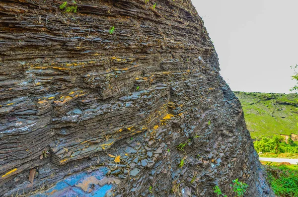 Layers of iron ore deposits in the mountains of Baba Budangiri at Chikmagalur, India