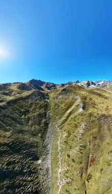 Alpine landscape with hiking trails near Tignes village, Savoy, Auvergne-Rhone-Alpes, France, Europe.     