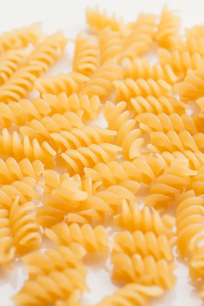 Pasta secca italiana su fondo bianco — Foto Stock