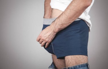 Man touching his penis. Masturbation