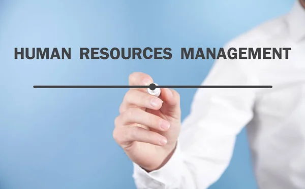 Man Writes Human Resources Management Text Screen — Stock Photo, Image